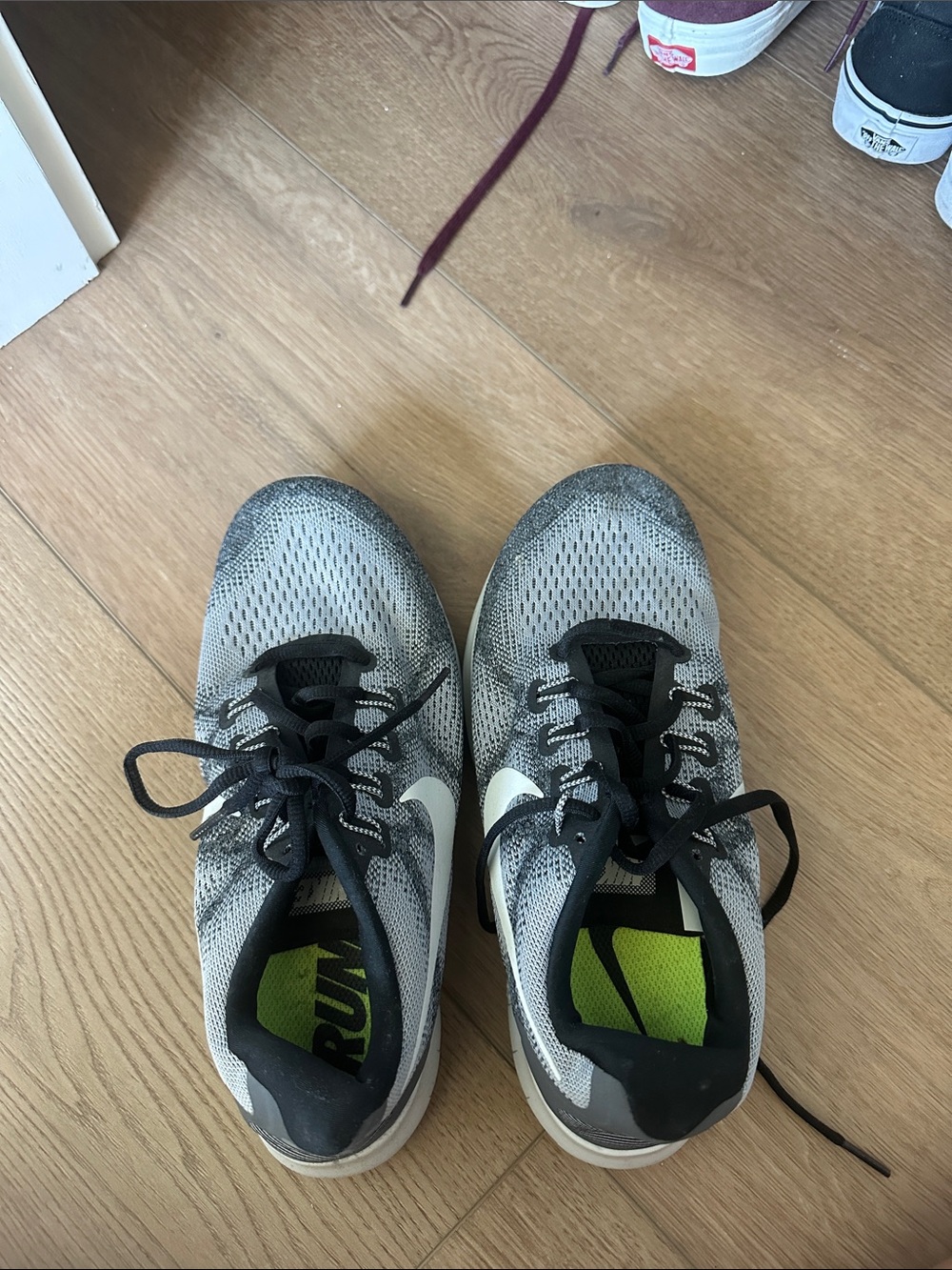 Nike Grey and Black Knit Sneakers with White Swoosh